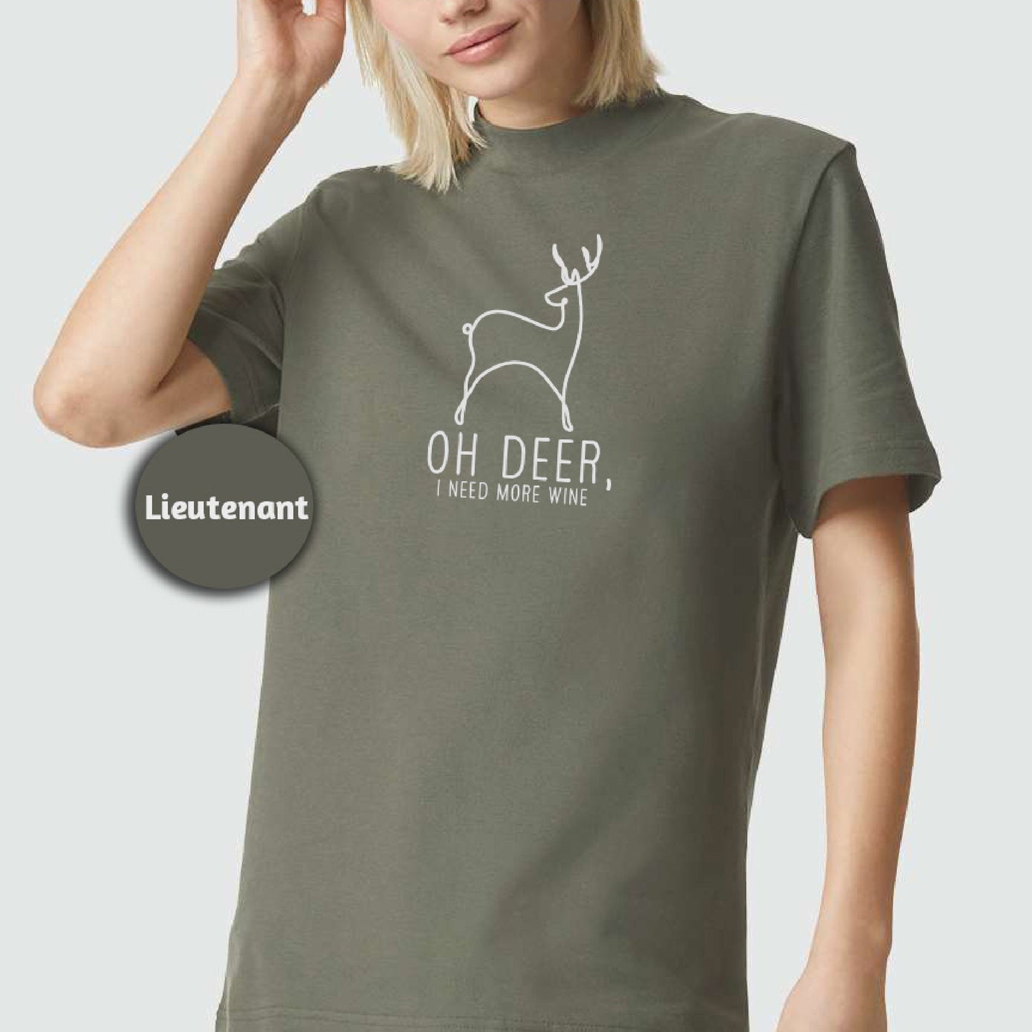 a woman wearing a t - shirt with a deer on it