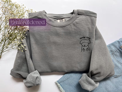 a gray sweater with a picture of a sheep on it