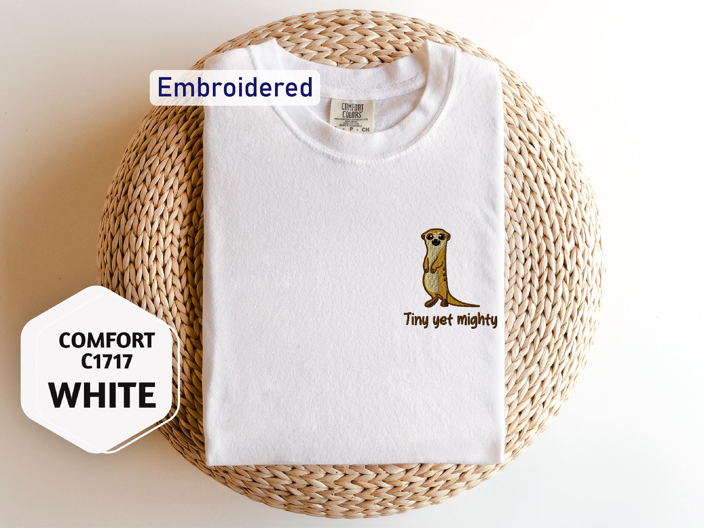 a white t - shirt with a picture of a meerkat on it