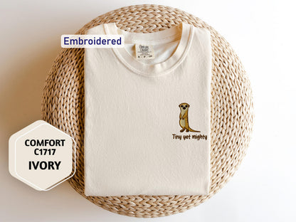 a white t - shirt with a picture of a beaver on it