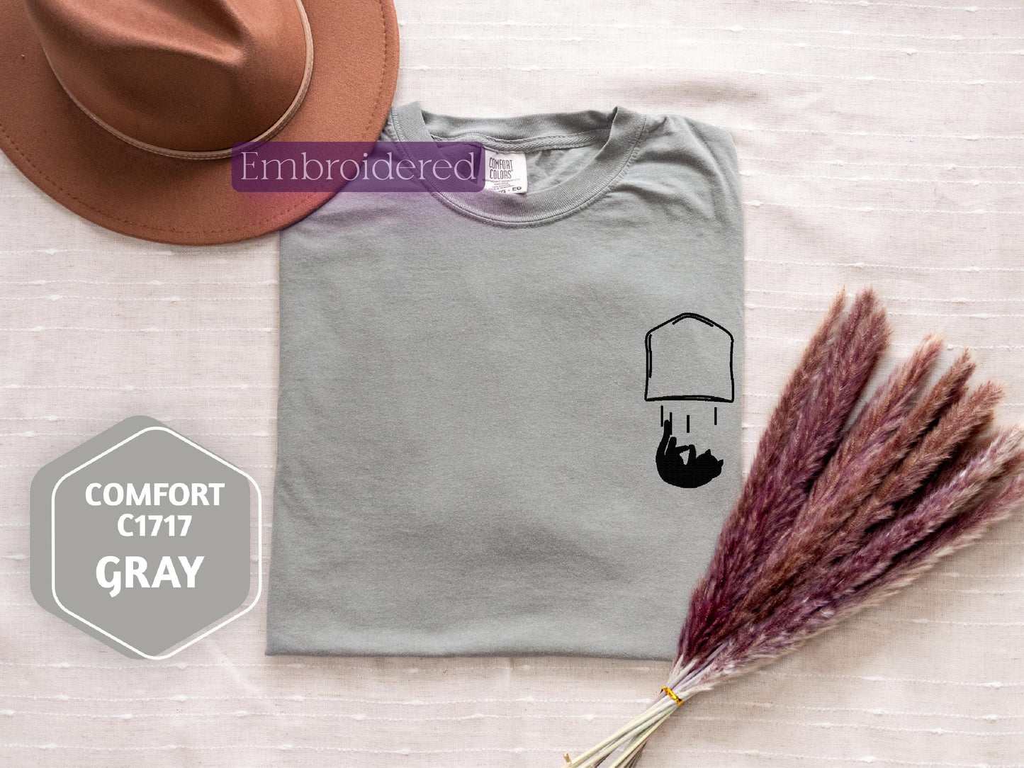a hat and a t - shirt with a picture of a hat on it