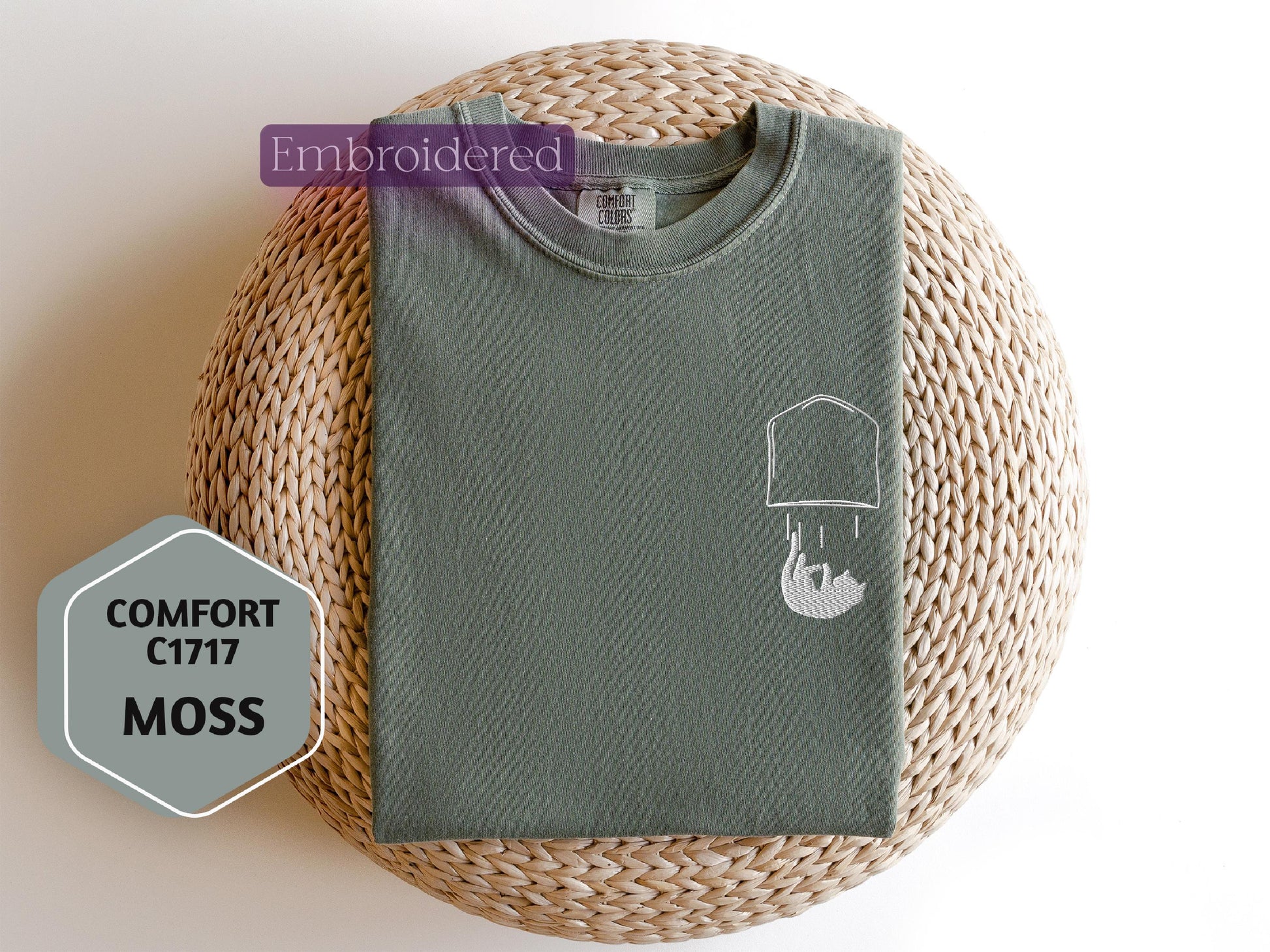 a green t - shirt with a picture of a lamp on it