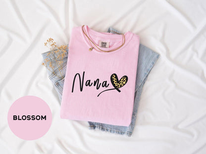 a pink shirt that says mama with a butterfly on it