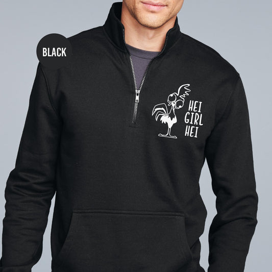 a man wearing a black hoodie with a white rooster on it