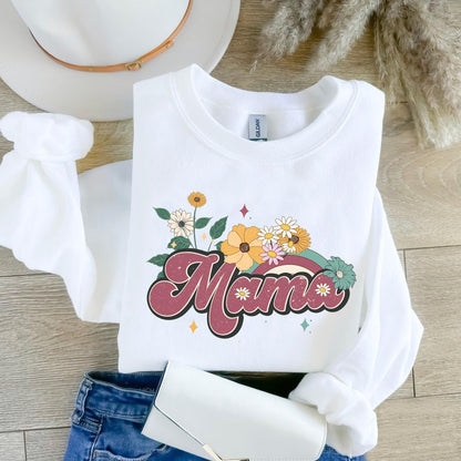 a white shirt that says mama with flowers on it