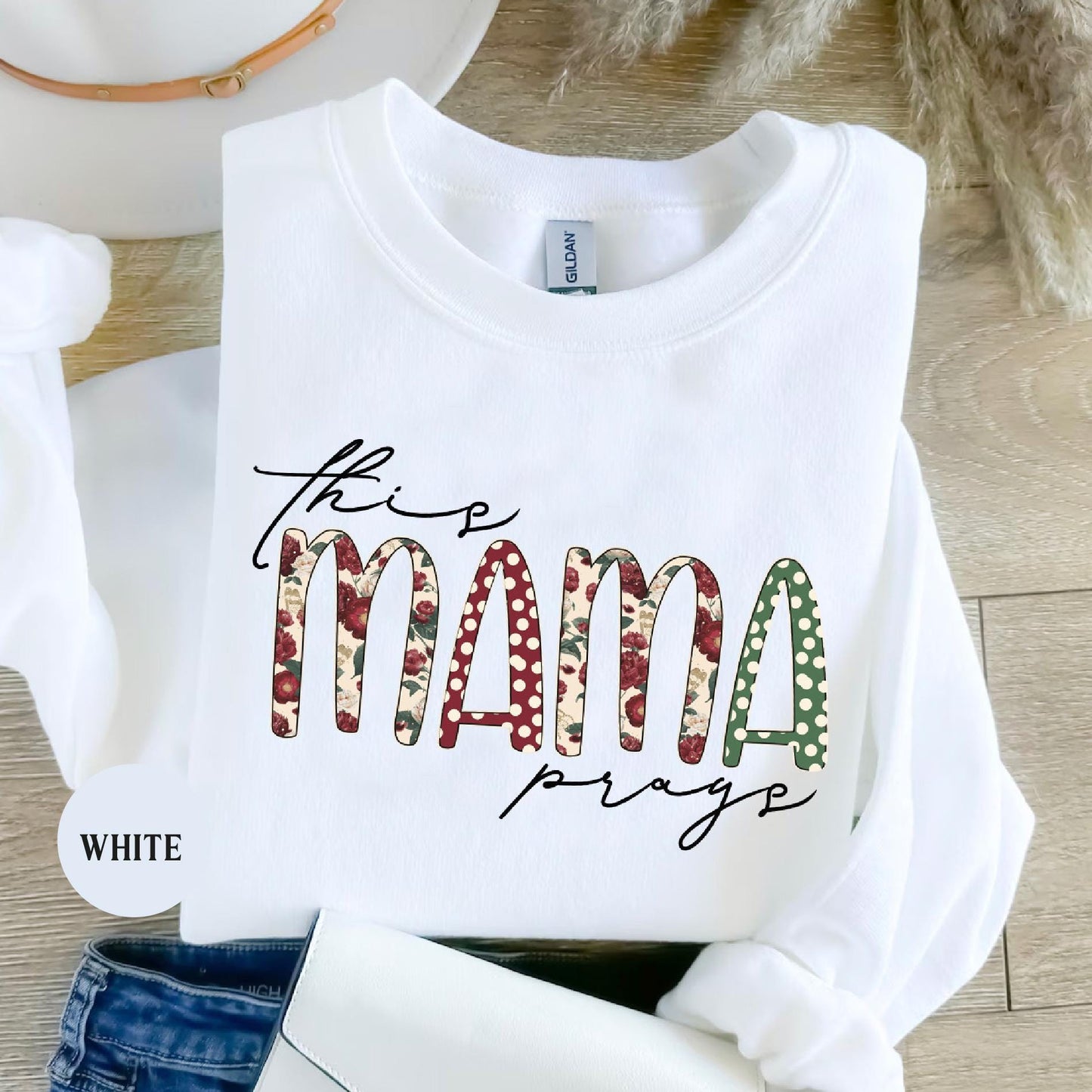 a white shirt with the word mama printed on it