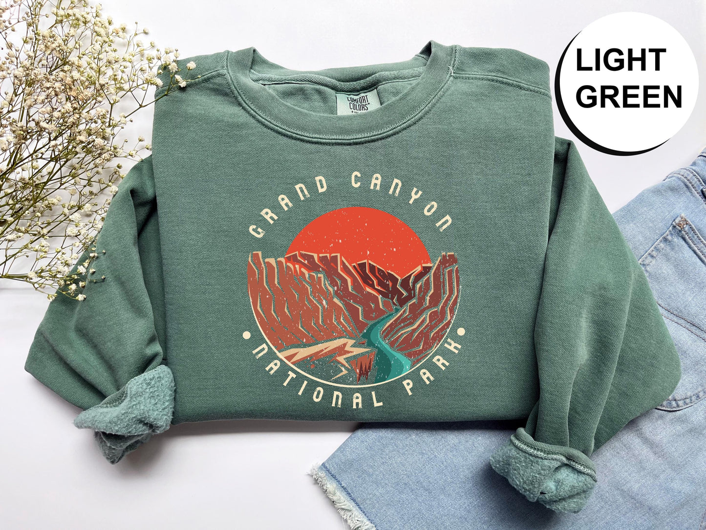 a green sweatshirt with the words grand canyon national park on it