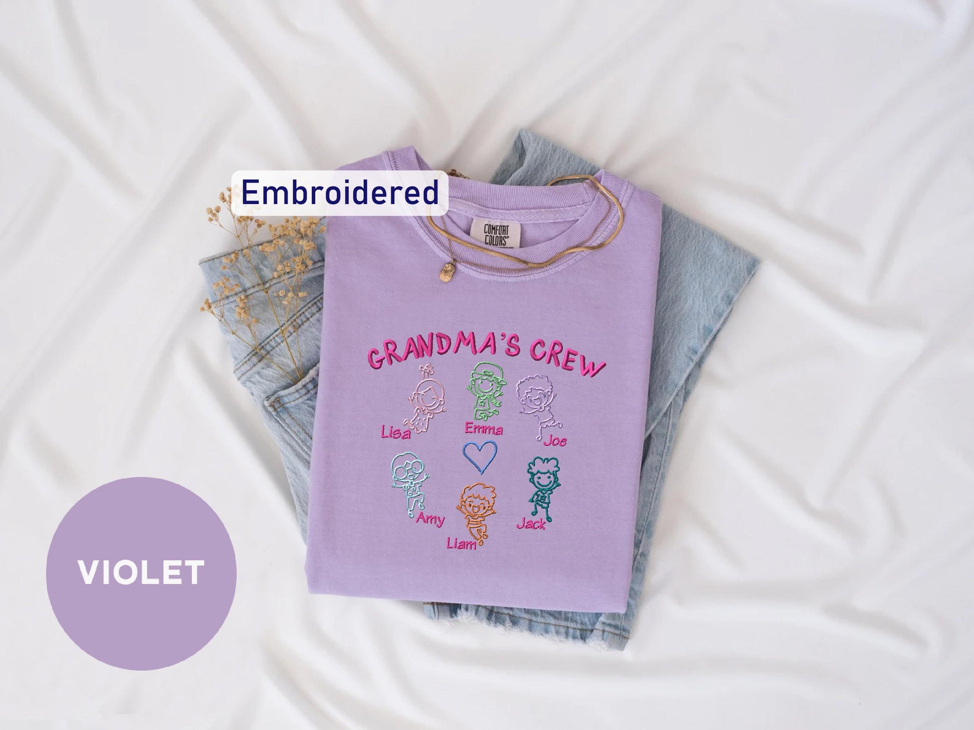 a purple shirt that says grandma's crew on it