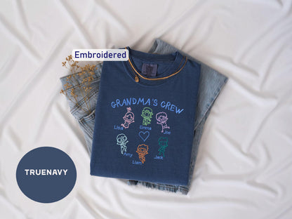 a t - shirt that says grandma's crew on it