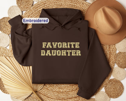 a brown hoodie with the words favorite daughter on it