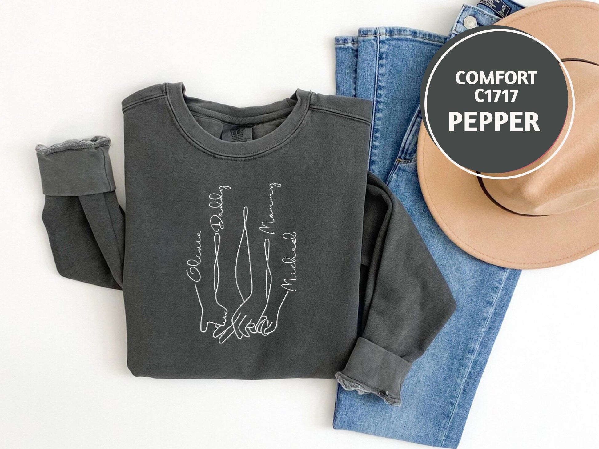 a pair of jeans and a t - shirt with a cowboy hat