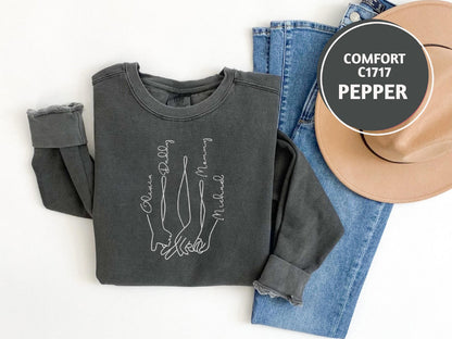 a pair of jeans and a t - shirt with a cowboy hat