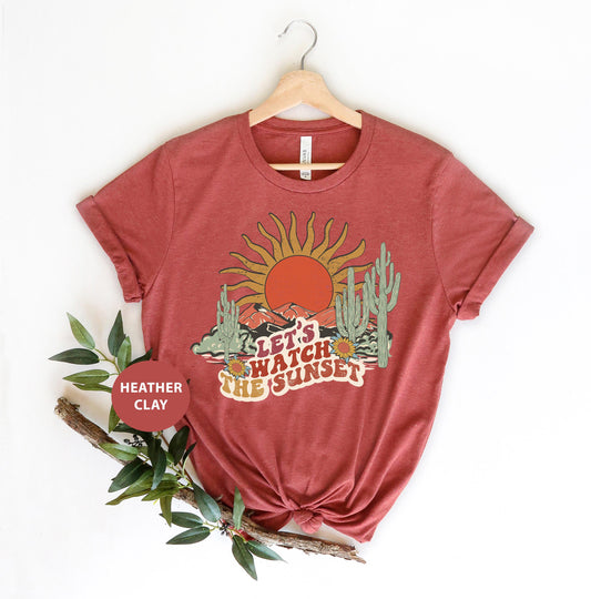 a t - shirt with a cactus design on it