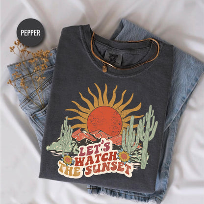 a t - shirt that says let's watch the sunset on it
