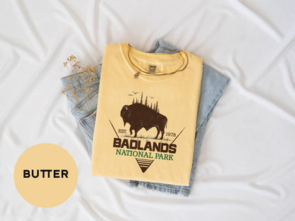 a t - shirt with a buffalo on it and the words badlands national park