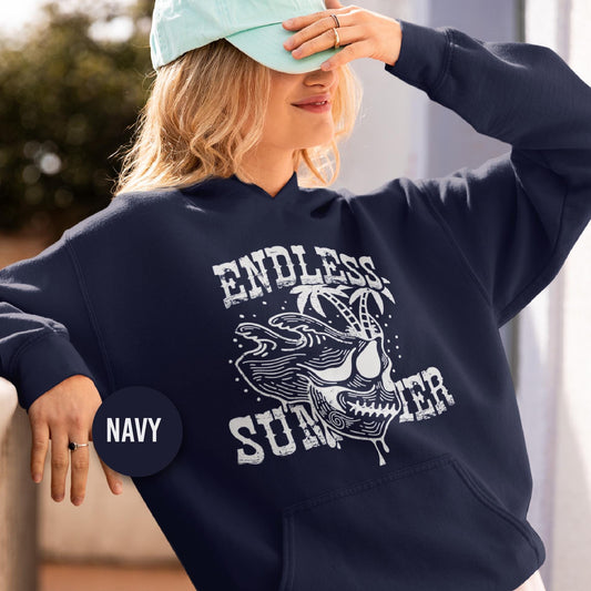 a woman wearing a navy hoodie with the words endless summer printed on it