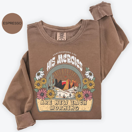 a brown shirt with a picture of a bird on it