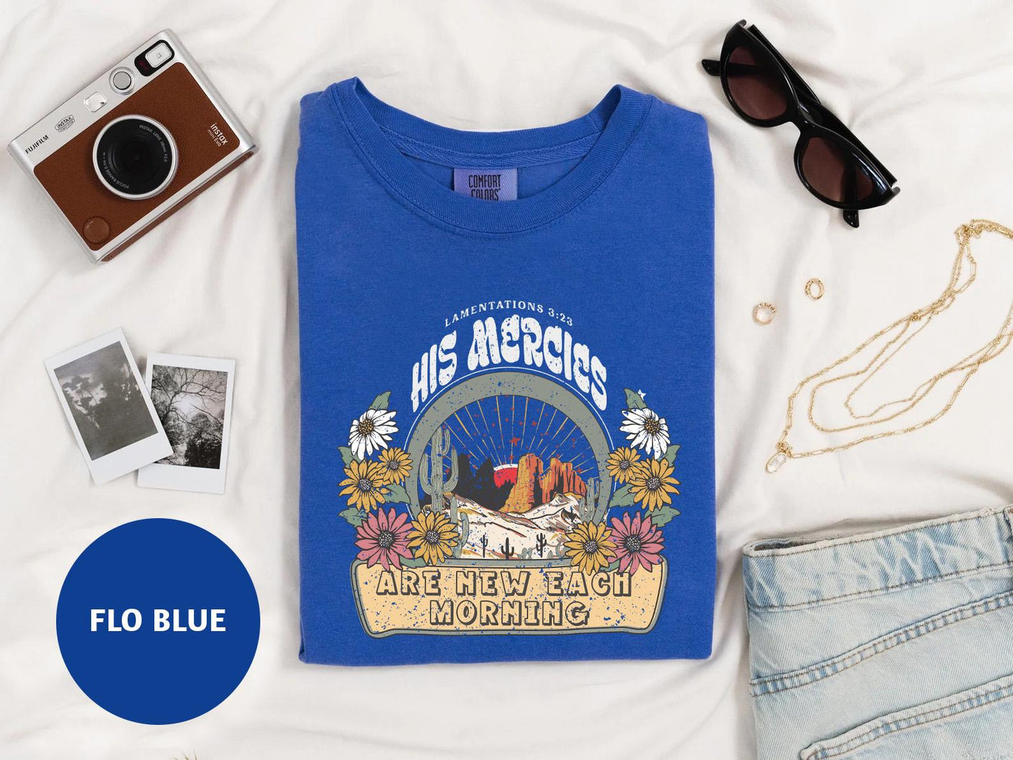 a blue t - shirt with a picture of an eagle on it