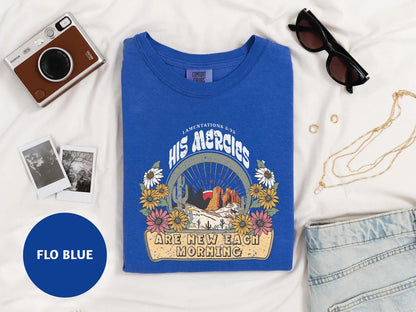 a blue t - shirt with a picture of an eagle on it