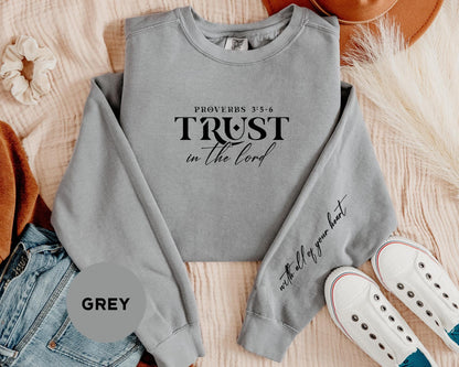 a grey sweatshirt with the words trust in the lord on it