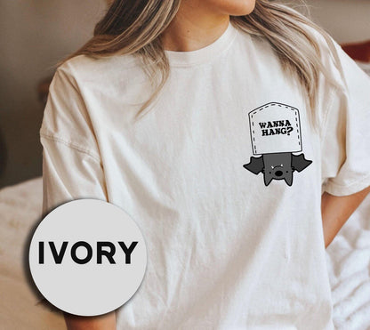 a woman wearing a t - shirt with a picture of a dog on it