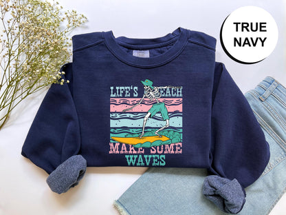 a t - shirt that says life's beach make some waves