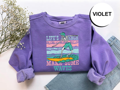 a purple shirt with a skeleton on it