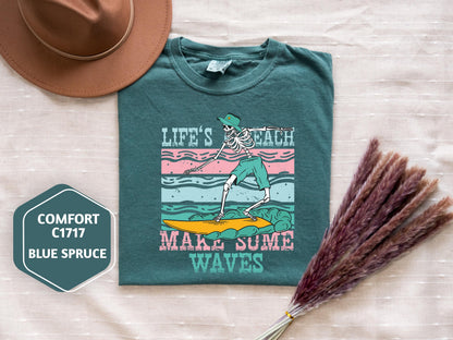 a t - shirt with a picture of a woman on a surfboard and a