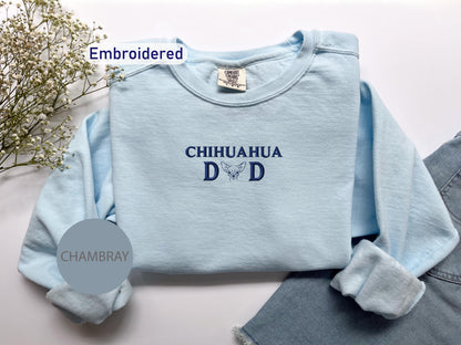 a blue shirt with the words chihuahua dad on it
