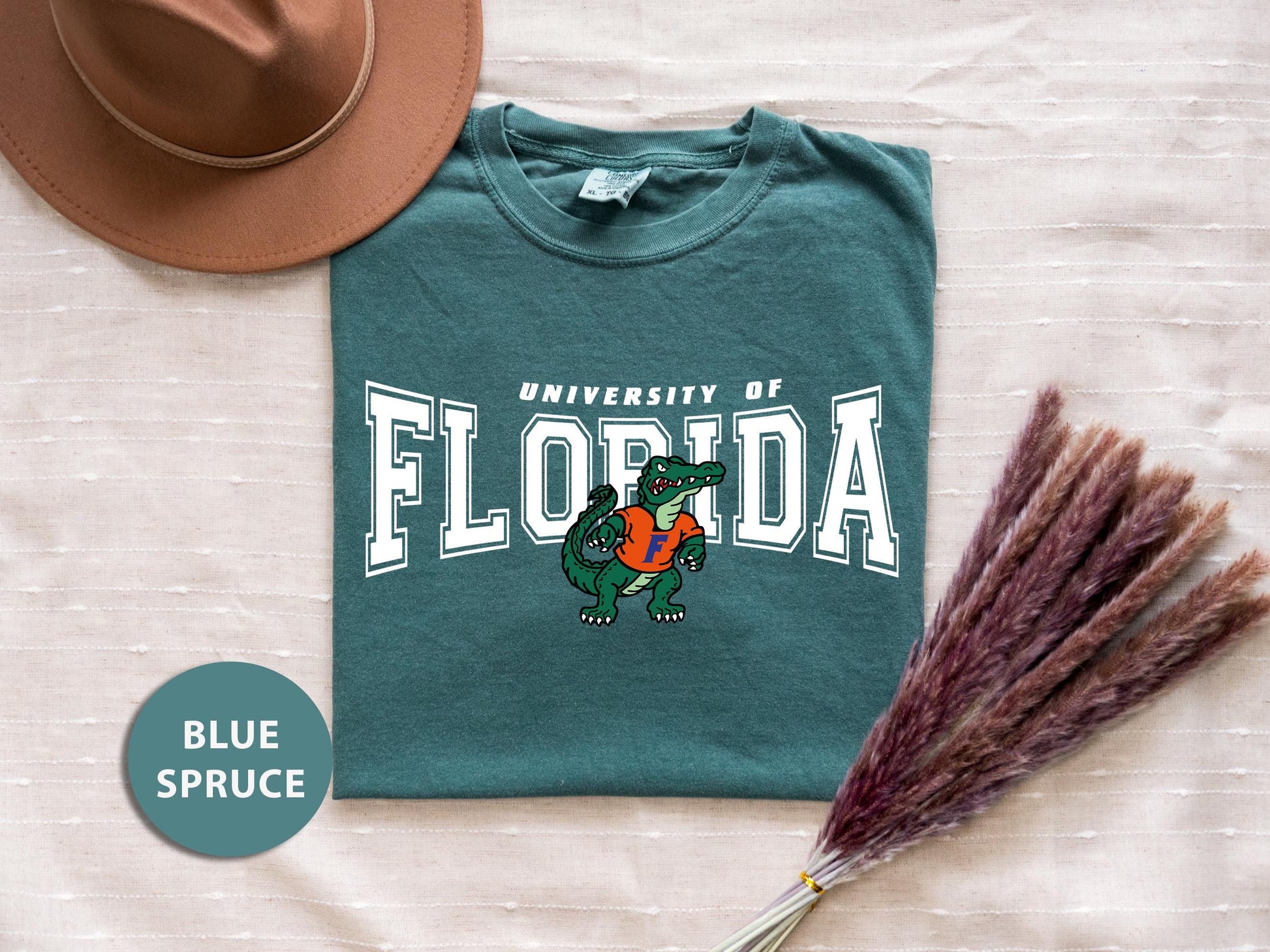 a t - shirt with the university of florida mascot on it