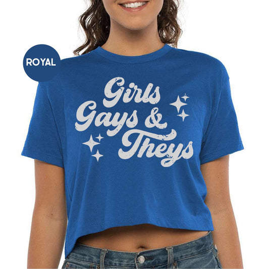 a woman wearing a blue shirt that says girls, gays and they's