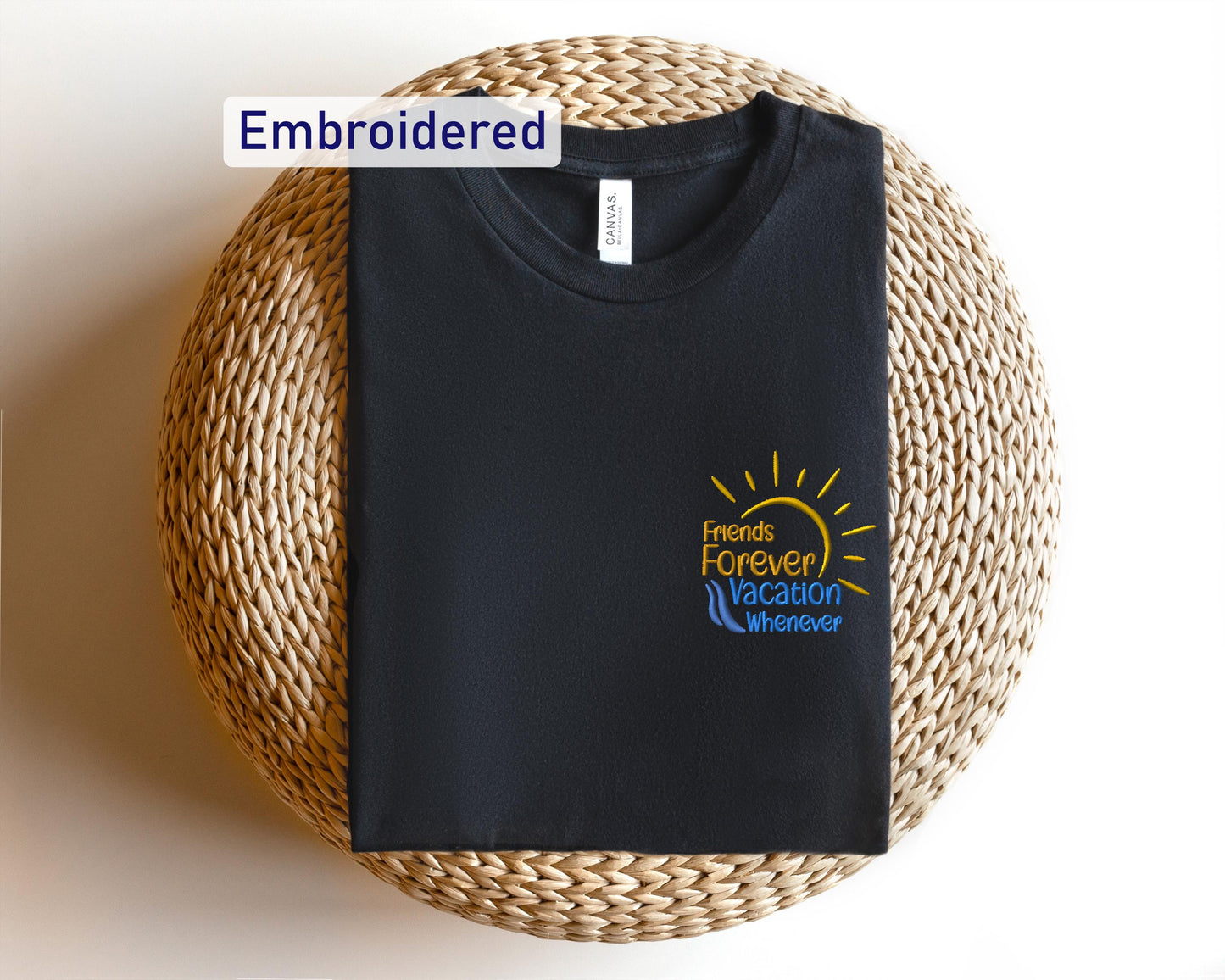 a black t - shirt with the logo of the french vacation experience on it