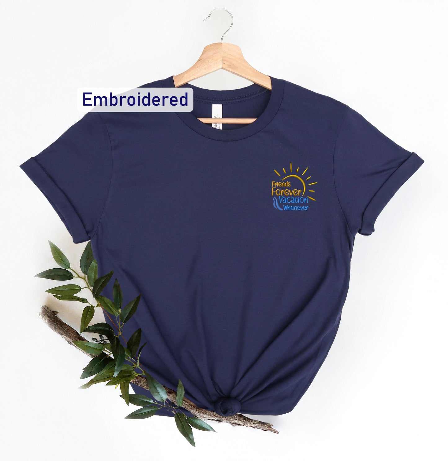 a blue t - shirt with the words embroidered on it