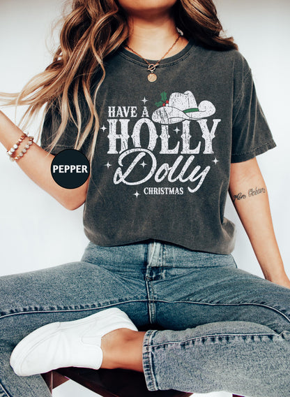 a woman sitting on a stool wearing a t - shirt that says have a holly
