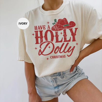 a woman wearing a t - shirt that says have a holly dolly christmas