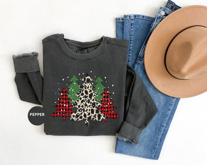 a pair of jeans, a hat, and a sweater