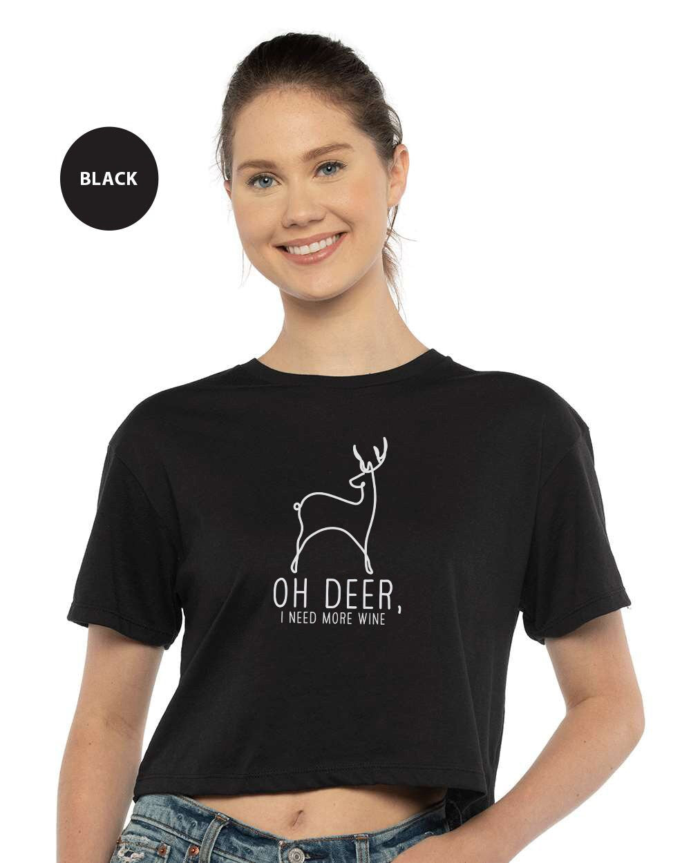 a woman wearing a black crop top that says oh deer, i need more wine