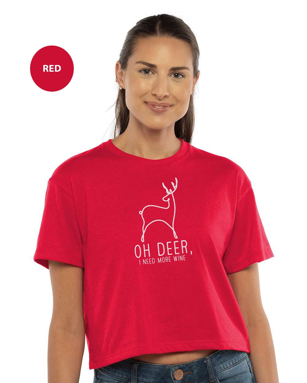 a woman wearing a red shirt with a deer on it