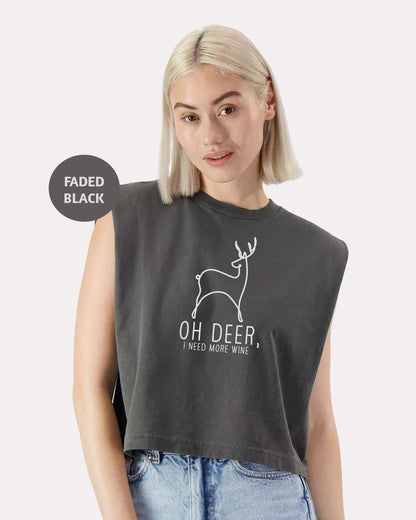 a woman wearing a crop top with a deer graphic on it