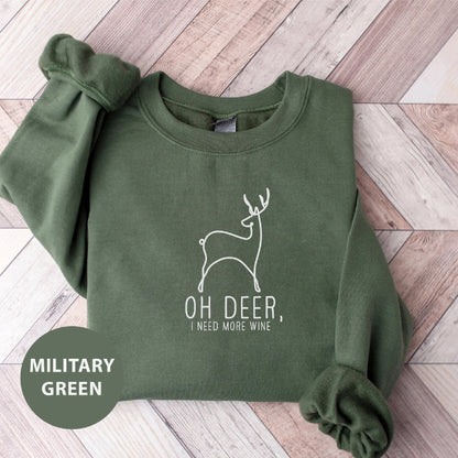 a green sweatshirt with a deer on it