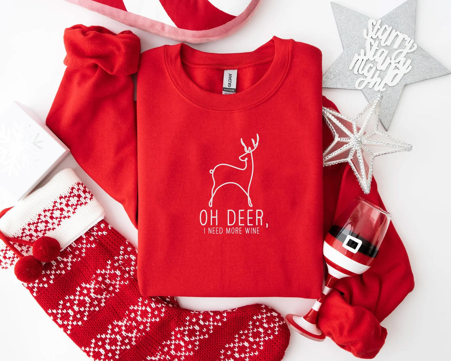 a red shirt with a deer on it