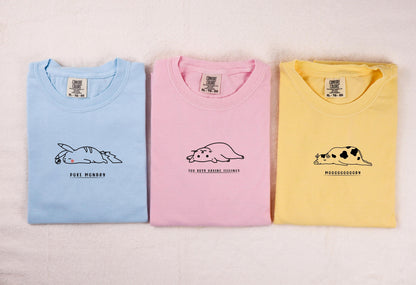 three t - shirts with animals on them on a white background