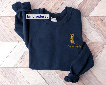 a blue sweater with an embroidered kangaroo on it