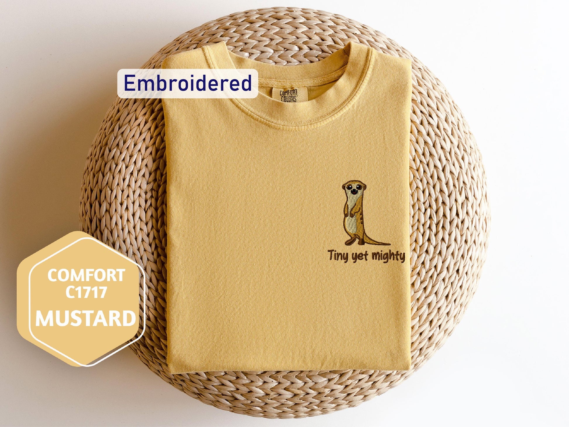 a t - shirt with a picture of a meerkat on it