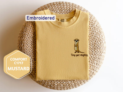 a t - shirt with a picture of a meerkat on it