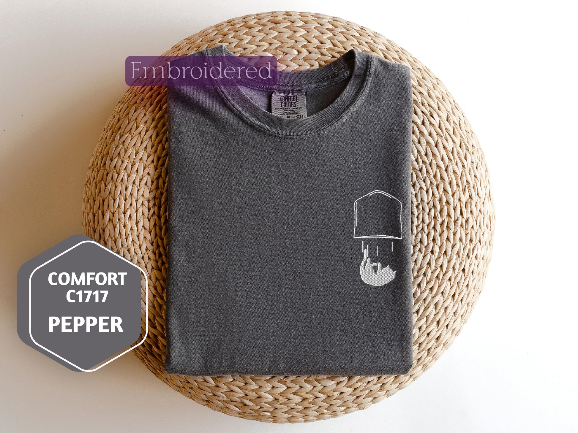 a t - shirt with a picture of a hat on it
