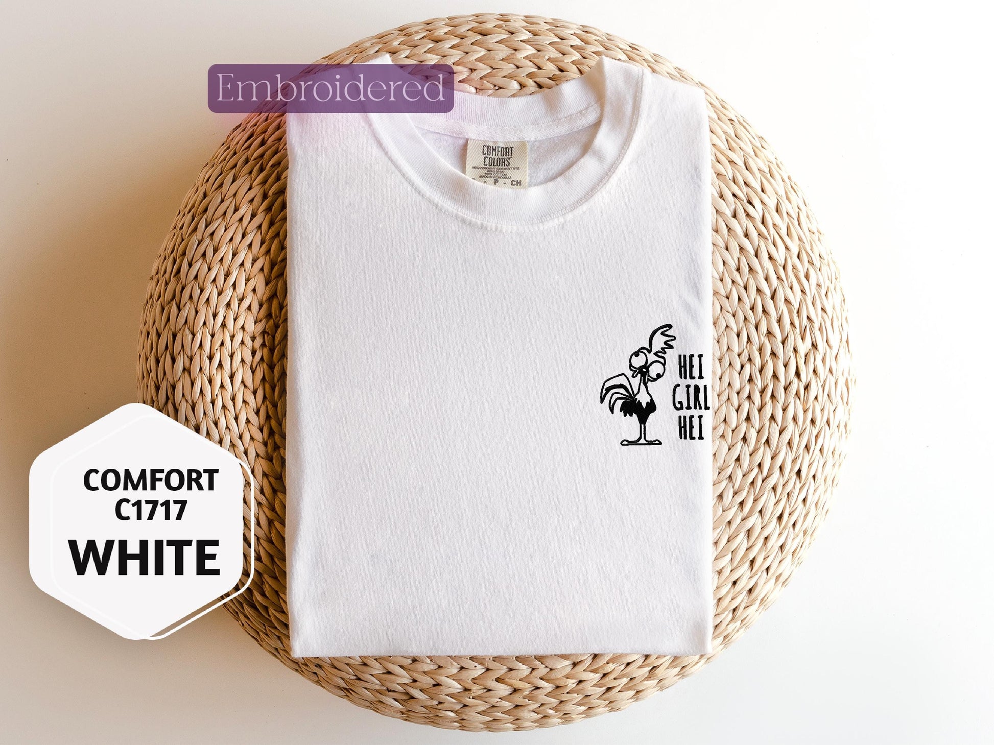a white t - shirt with a black rooster on it