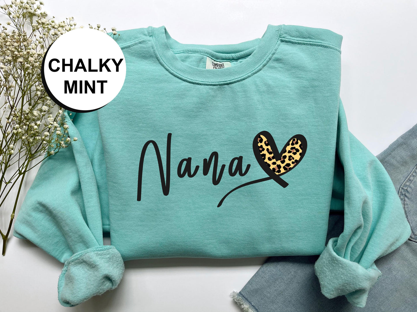 a green shirt with the word nama printed on it