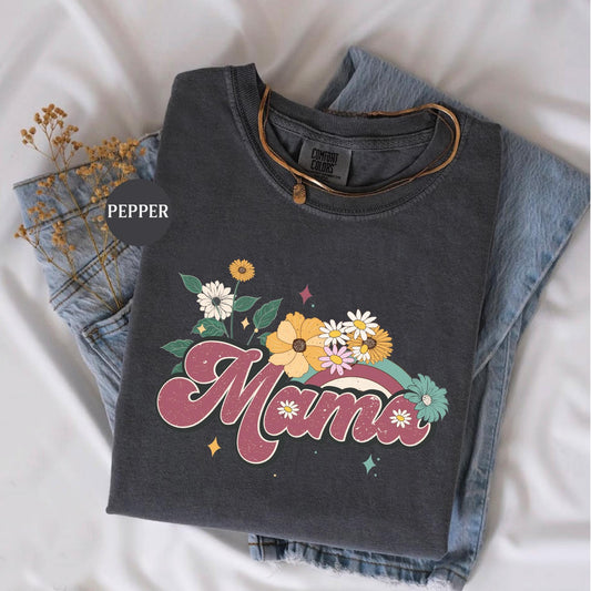 a t - shirt that says mama with flowers on it