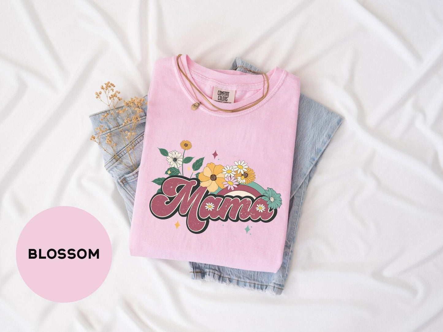 a pink shirt with the word mama on it